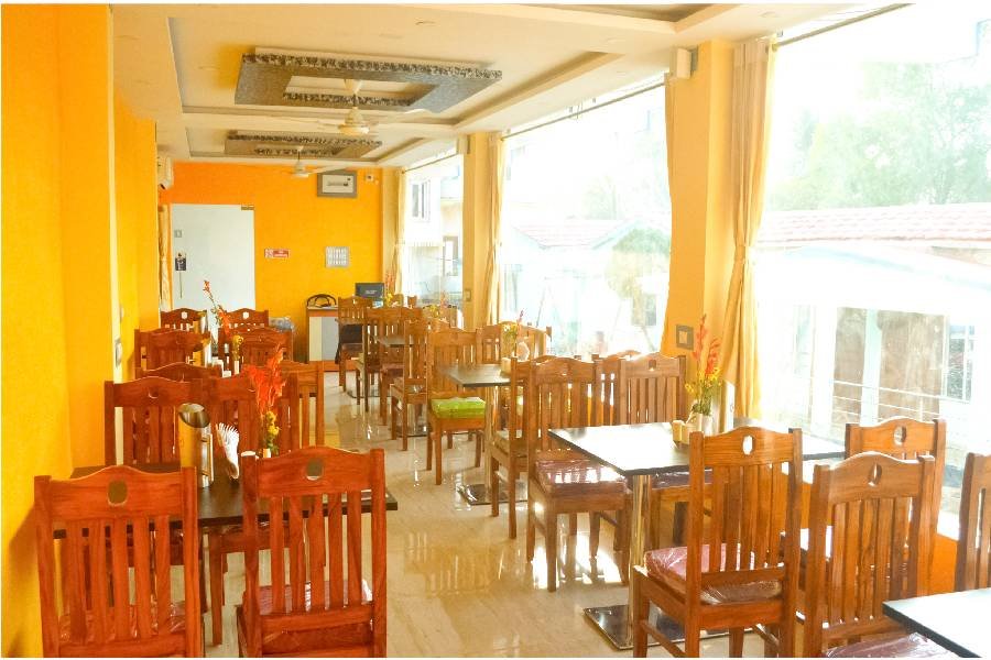 Sunlit dining room of the Momo Restaurant